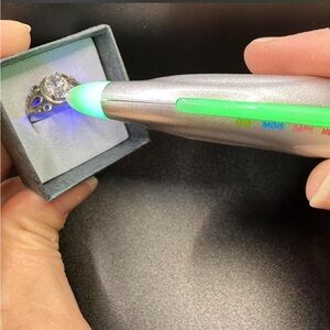 Antique sterling silver ring with round diamond